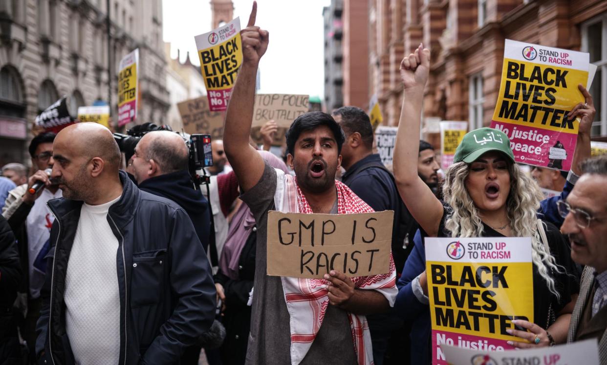 <span>People demonstrate in Manchester over the ‘barbaric’ arrest at Manchester airport.</span><span>Photograph: James Speakman/PA</span>