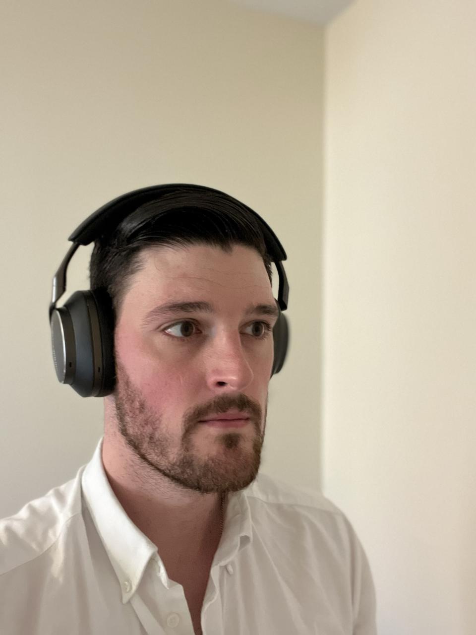 Bowers Wilkins Px8 ANC Headphones Review reviewer wearing 