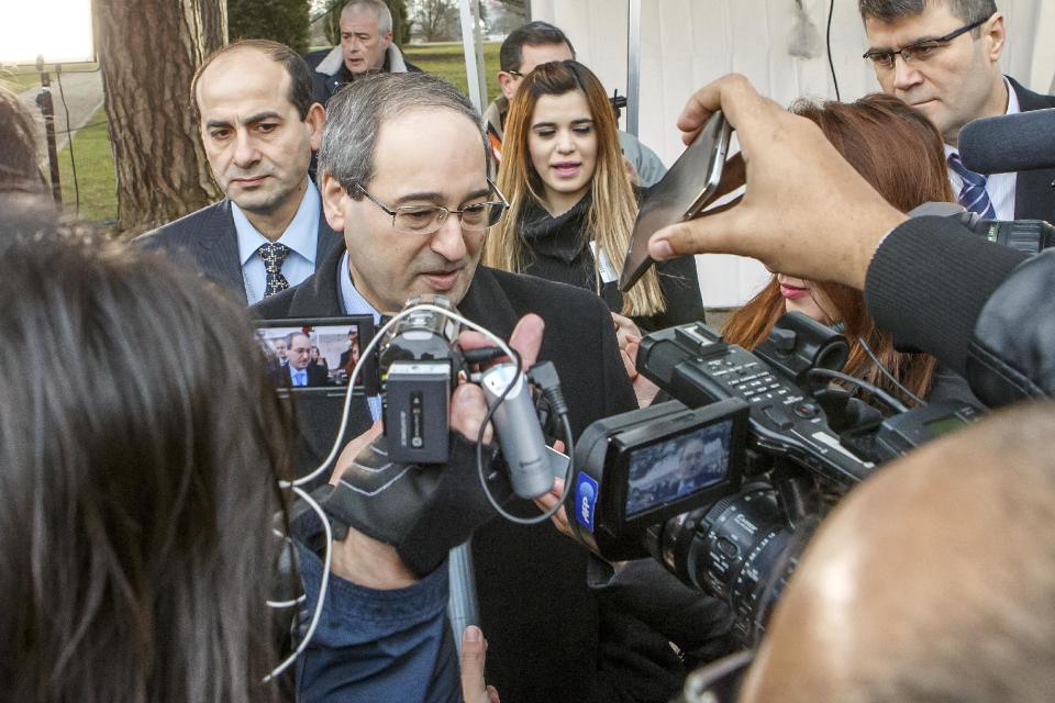 Syrian Deputy Foreign Minister Faisal Mekdad speaks to the press at the European headquarters of the United Nations, in Geneva, Switzerland, Saturday, Jan. 25, 2014. Two Syrian delegations, representatives of Syrian President Bashar Assad and Syrian opposition, are meeting together with the Joint Special Representative. (AP Photo/Keystone,Salvatore Di Nolfi)