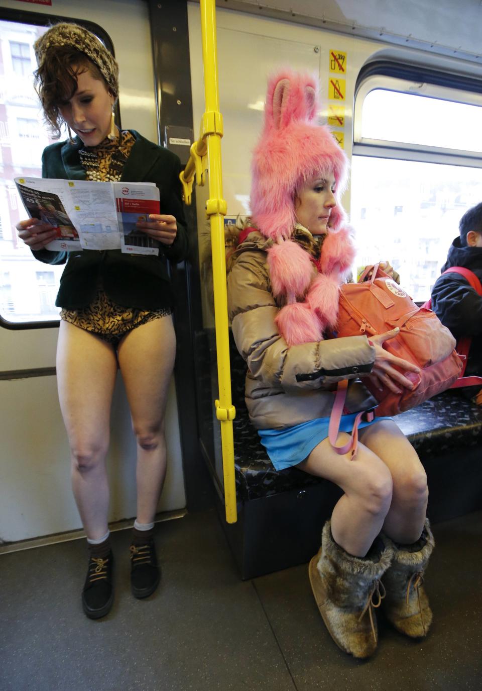 Passengers without their pants use a subway train during the "No Pants Subway Ride" in Berlin