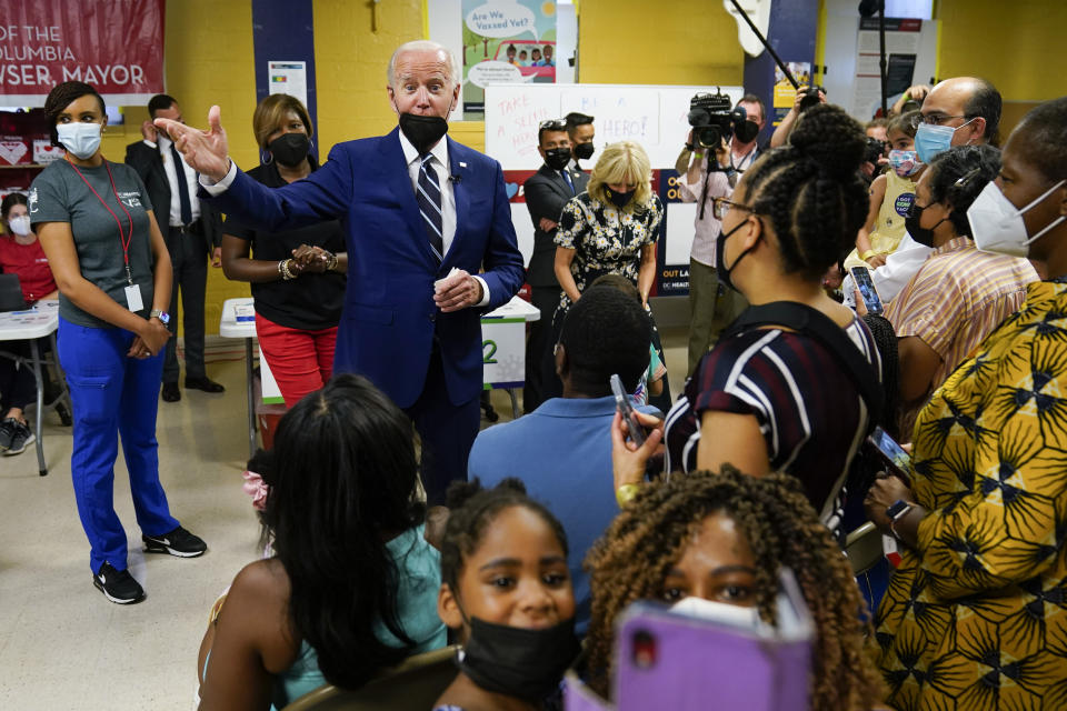 President Joe Biden visits a COVID-19 vaccination clinic at the Church of the Holy Communion Tuesday, June 21, 2022, in Washington. (AP Photo/Evan Vucci)