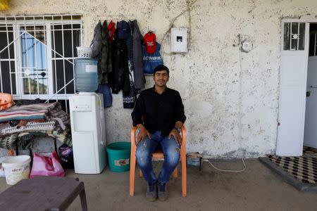 Welat Aydin poses for a picture during an interview with Reuters in Mardin, June 6, 2018. REUTERS/Umit Bektas