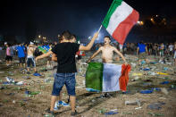 ROME, ITALY - JULY 01: Italian fans react after the defaet at the UEFA EURO 2012 final match between Italy and Spain on a big screen at the Circus Maximo on July 1, 2012 in Rome, Italy. (Photo by Giorgio Cosulich/Getty Images)