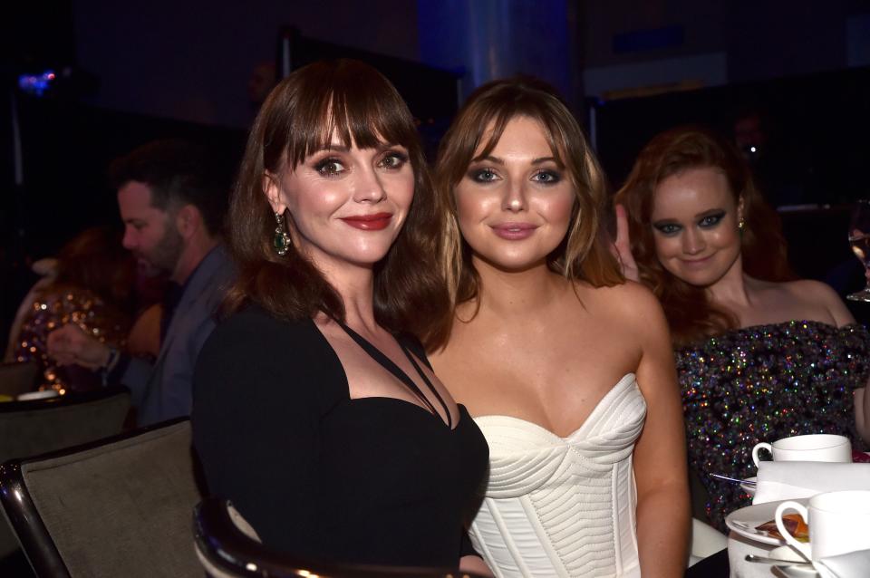 Christina Ricci, left, ) with "Yellowjackets" co-stars Samantha Hanratty and Liv Hewson at the GLAAD Media Awards in April.