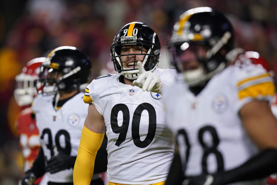 Pittsburgh Steelers outside linebacker T.J. Watt (90) celebrates after returning a fumble for a touchdown during the first half of an NFL wild-card playoff football game against the Kansas City Chiefs, Sunday, Jan. 16, 2022, in Kansas City, Mo. (AP Photo/Ed Zurga)