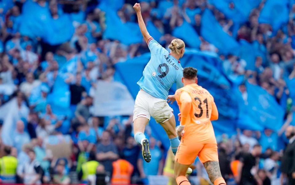 Manchester City's Erling Haaland celebrates after his team won the English FA Cup final soccer match - AP/Jon Super