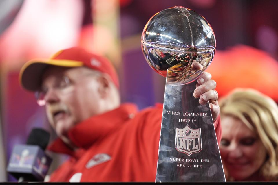 Kansas City Chiefs head coach Andy Reid holds the Vince Lombardi Trophy after the NFL Super Bowl 58 football game against the San Francisco 49ers on Sunday, Feb. 11, 2024, in Las Vegas. The Kansas City Chiefs won 25-22 against the San Francisco 49ers. (AP Photo/Ashley Landis)