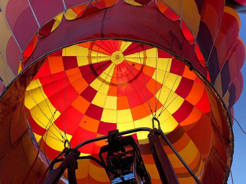 Hot air balloons are inflated during the annual Albuquerque International Balloon Fiesta in Albuquerque, N.M., on Saturday, Oct. 5, 2019. Organizers are expecting tens of thousands of spectators for opening weekend and exponentially more over the course of the nine-day event. (AP Photo/Susan Montoya Bryan)