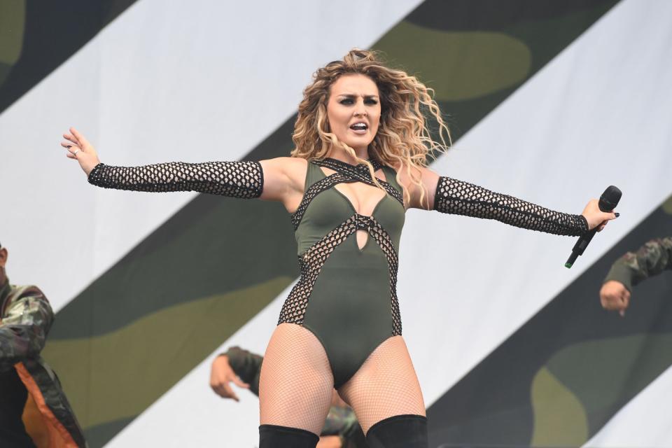 On the mend: Perrie Edwards is out of hospital: Stuart C. Wilson/Getty