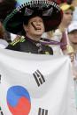 <p>A fan holds a South Korea flag before a group C match of the men’s Olympic football tournament between Germany and South Korea at the Fonte Nova Arena in Salvador, Brazil, Sunday, Aug. 7, 2016. (AP Photo/Arisson Marinho) </p>