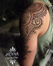 <p>The henna paste is piped in a design on the skin and left to sit so it leaves a stain. </p>