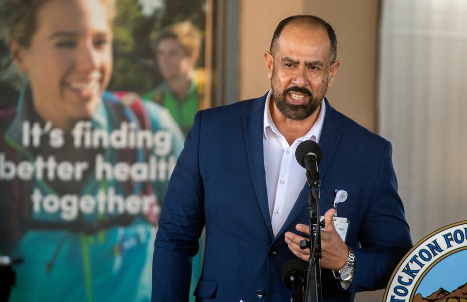 Community Medical Centers chief behavioral health officer Alfonso Apu speaks at the introduction of Stockton’s first-of -its-kind mobile crisis intervention response pilot program during a new conference at the Stockton Ballpark in downtown Stockton on Thursday, Nov. 3, 2022. The program, a joint venture between CMC and the City of Stockton, will deal behavioral health calls that are currently handled by the police.