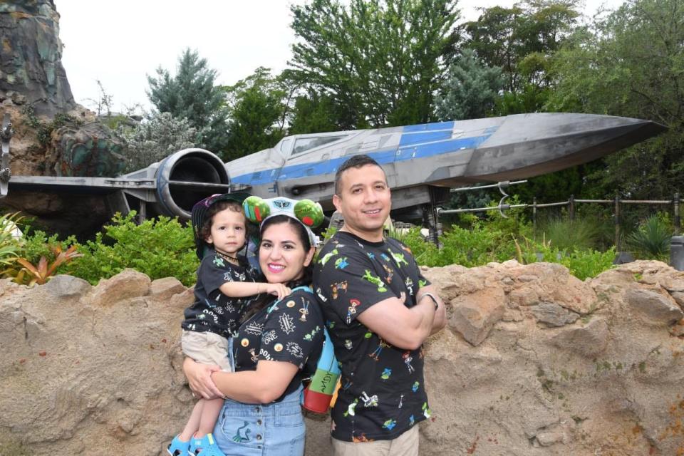 Disney fan Jacqueline Griego and her family at Galaxy's Edge in Disney World.