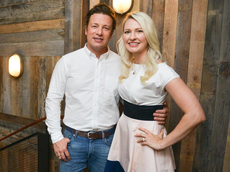 Food blogger and dietician Abbey Sharp with Jamie Oliver (WireImage)