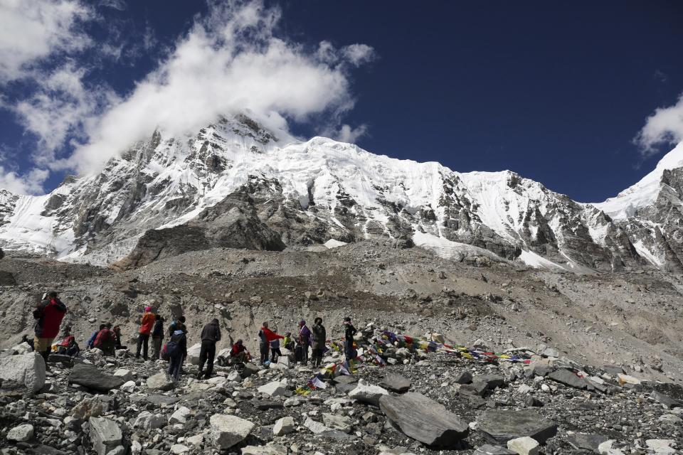 Mount Everest peeks through the clouds in this Sept.