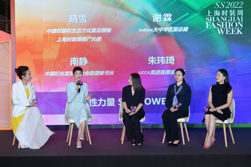 Xiao Xue hosting a panel discussion during the Shanghai Fashion Week press conference. - Credit: Courtesy