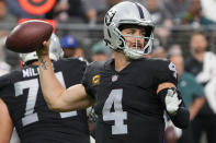 Las Vegas Raiders quarterback Derek Carr (4) throws against the Philadelphia Eagles during the first half of an NFL football game, Sunday, Oct. 24, 2021, in Las Vegas. (AP Photo/Rick Scuteri)