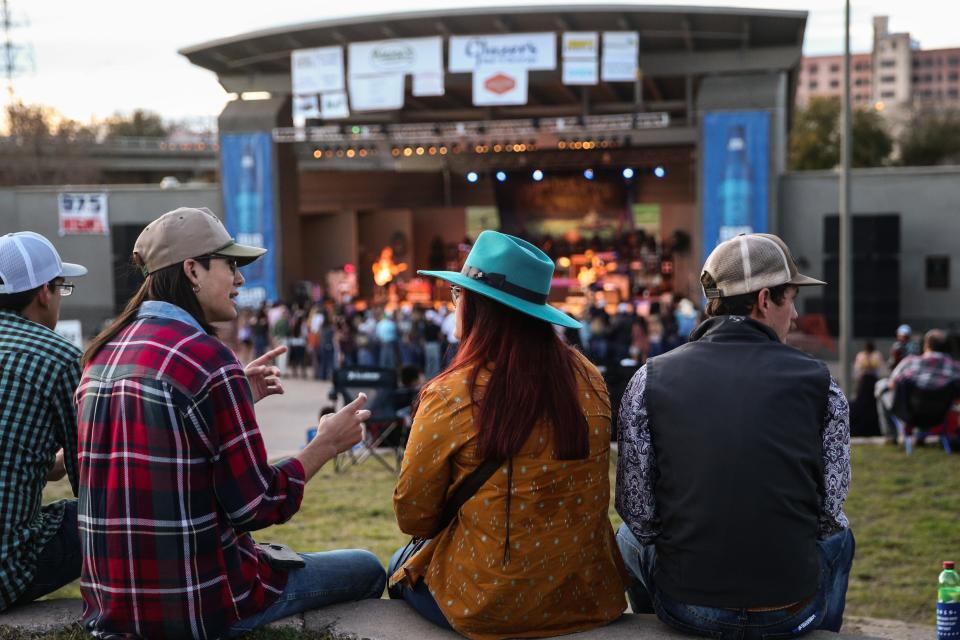 Concert goers hang out as Kody West band performs during Wild West Fest Friday, March 1, 2019, at the Bill Aylor Sr. Memorial RiverStage.