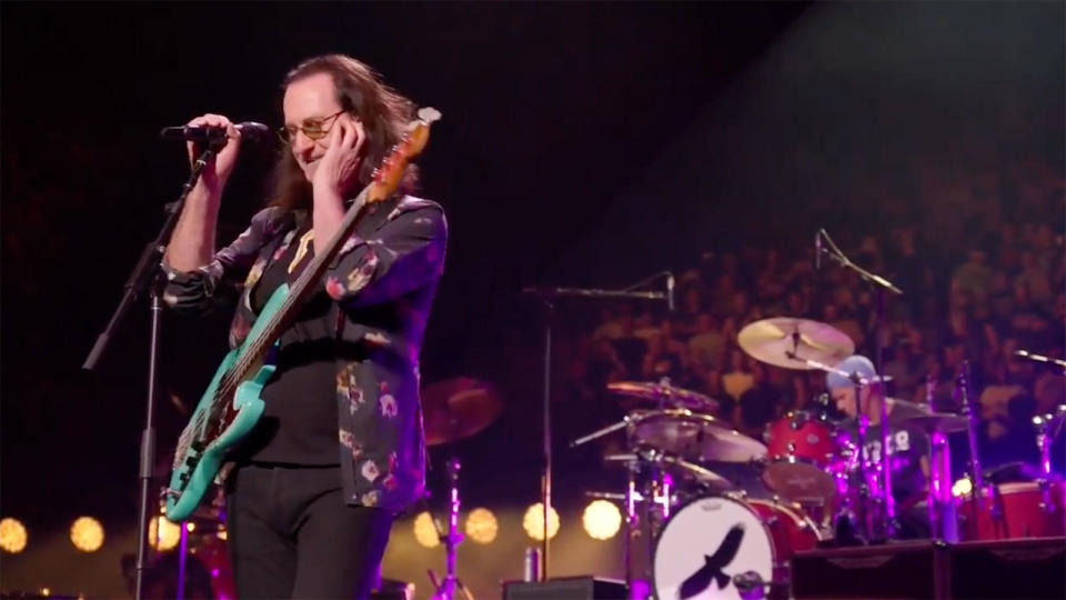 Rush's Geddy Lee onstage with Chad Smith