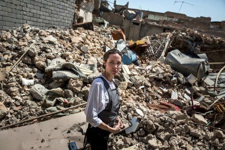 UNHCR Special Envoy Angelina Jolie visits the Old City in West Mosul, Iraq June 16, 2018. UNHCR/Andrew McConnell/Handout via REUTERS