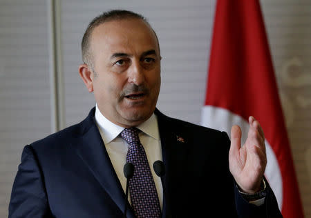 FILE PHOTO - Turkish Foreign Minister Mevlut Cavusoglu gives a speech to the media at the foreign ministry building (SRE) in Mexico City, Mexico February 3, 2017. REUTERS/Henry Romero/File Photo