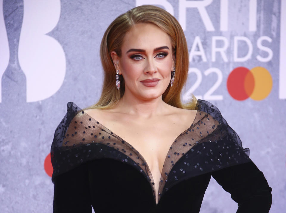 FILE - Adele appears at the Brit Awards 2022 in London on Feb. 8, 2022. Adele is nominated for seven Grammy Awards. The 2023 Grammy Awards will air live Sunday, Feb. 5. (Photo by Joel C Ryan/Invision/AP, File)