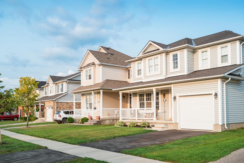 row of new homes and front yards in Brantford Ontario Canada.