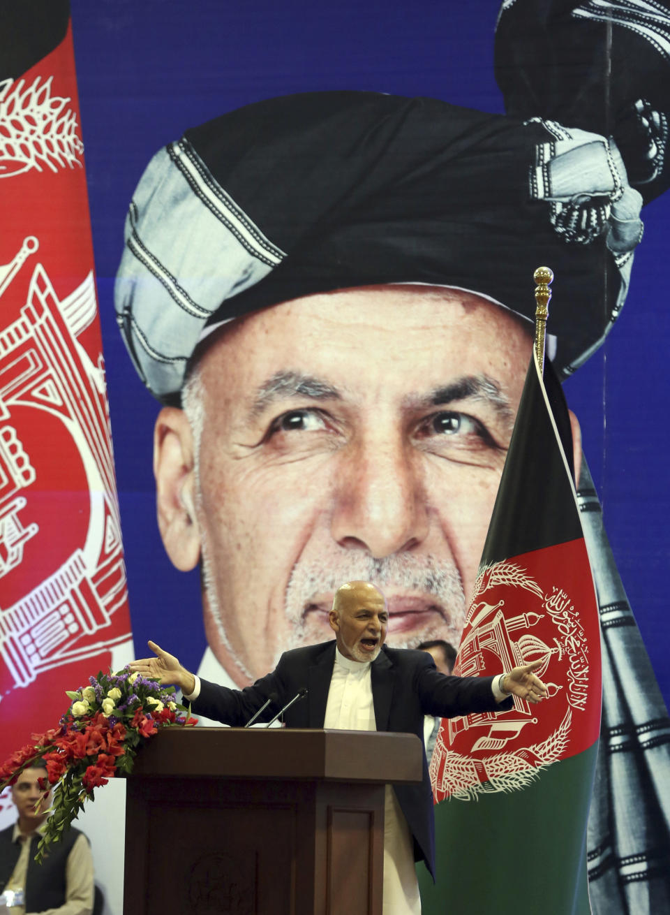 Afghan presidential candidate Ashraf Ghani speaks during the first day of campaigning in Kabul, Afghanistan, Sunday, July 28, 2019. Sunday marked the first day of campaigning for presidential elections scheduled for Sept. 28. President Ghani is seeking a second term on promises of ending the 18-year war but has been largely sidelined over the past year as the U.S. has negotiated directly with the Taliban. (AP Photo/Rahmat Gul)