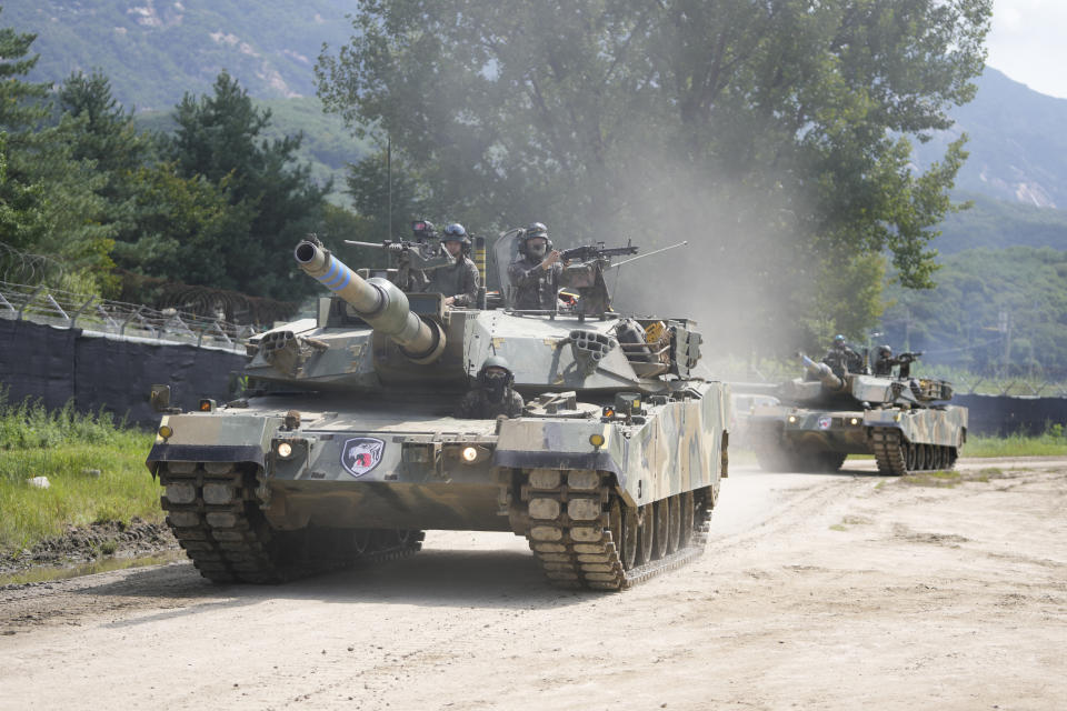 South Korean Army's K1A2 tanks move during the combined wet gap crossing military drill between South Korea and the United States as a part of the Ulchi Freedom Shield military exercise in Cheorwon, South Korea, Thursday, Aug. 31, 2023. (AP Photo/Lee Jin-man)