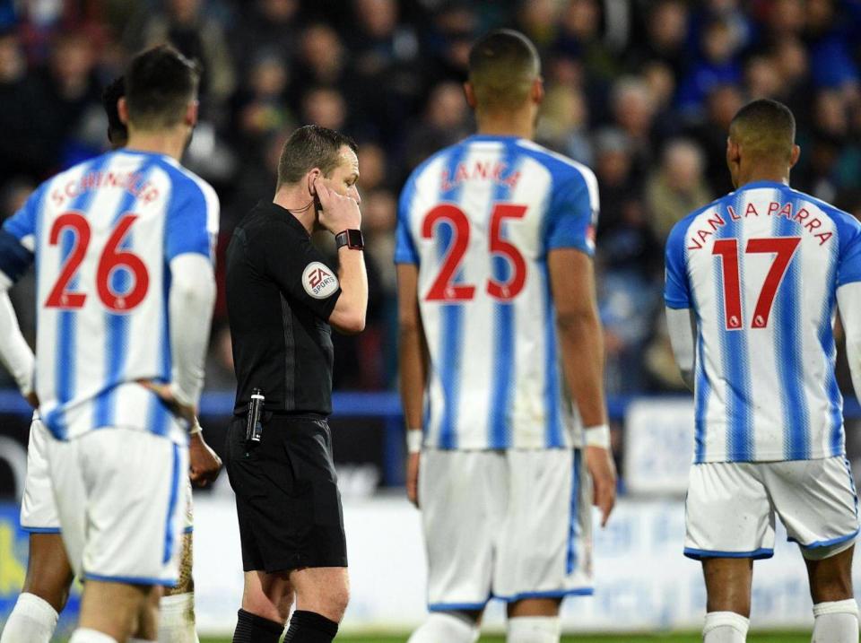 Kevin Friend turned to the VAR to help with an offside decision (AFP/Getty Images)