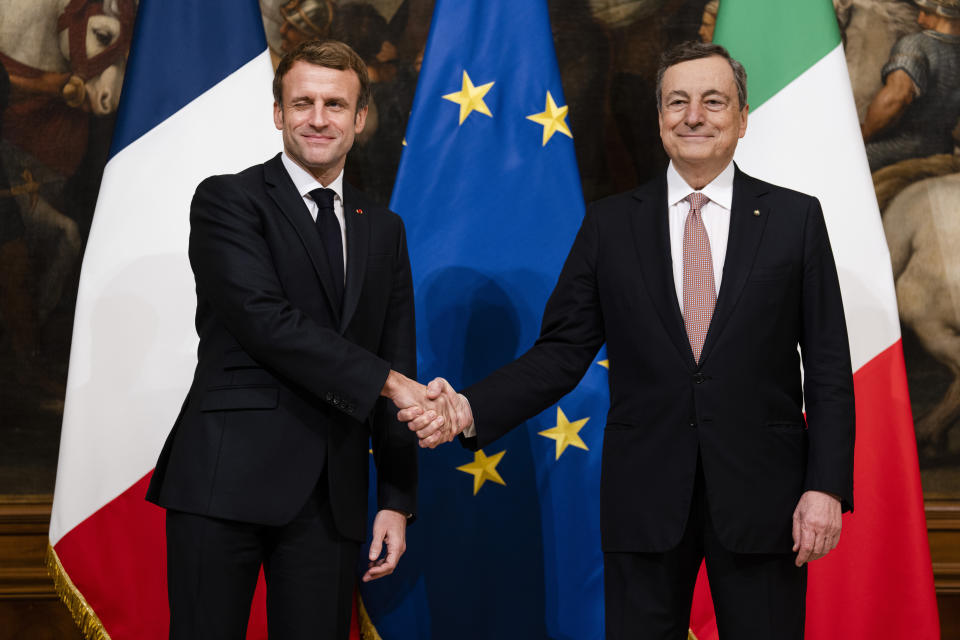 French President Emmanuel Macron, left, and Italian Prime Minister Mario Draghi right, meet at Palazzo Chigi Government's Office in Rome, Thursday Nov. 25, 2021. Macron, who will also meet Pope Francis on Friday, is in Italy to sign the Quirinale Treaty which aims to provide a stable and formalized framework for cooperation in relations between the two countries. (AP Photo/Domenico Stinellis, Pool)