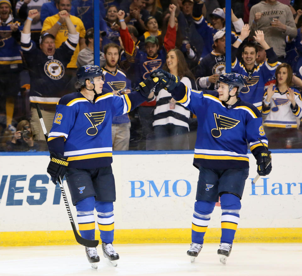 St. Louis Blues center Jori Lehtera, left, is congratulated by right wing Vladimir Tarasenko after he scored an unassisted goal during the third period of an NHL hockey game Saturday, April 11, 2015, in St. Louis. The Blues won 4-2. (Chris Lee/St. Louis Post-Dispatch via AP) EDWARDSVILLE INTELLIGENCER OUT; THE ALTON TELEGRAPH OUT; MANDATORY CREDIT