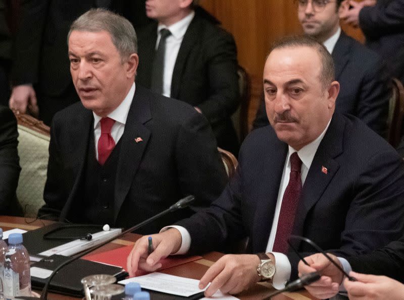 FILE PHOTO: Turkish Foreign Minister Mevlut Cavusoglu and Defence Minister Hulusi Akar attend a meeting with Russian Foreign Minister Sergei Lavrov and Defence Minister Sergei Shoigu in Moscow