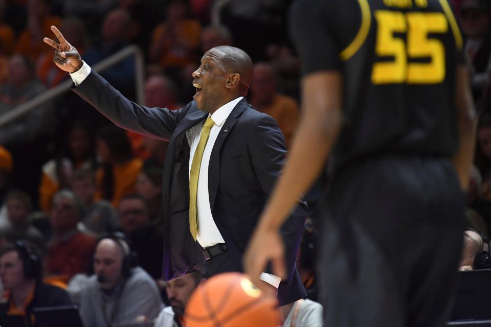Missouri head coach Dennis Gates yells to players during an NCAA college basketball game between the Missouri Tigers and the Tennessee Volunteers in Thompson-Boling Arena in Knoxville, Saturday Feb. 11, 2023. 