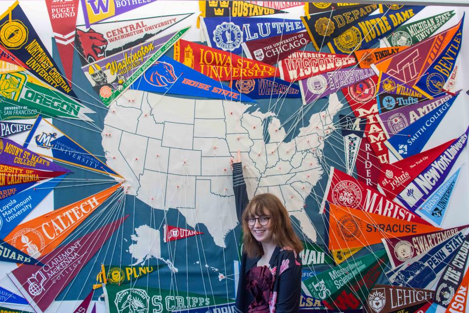 Emma Graham points to Grinnell College in Iowa, where she will study biochemistry starting this fall. She is photographed at Palm Desert High School on Jan. 5.
