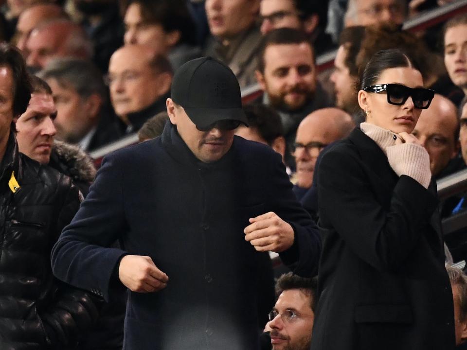 Leonardo DiCaprio and Camila Morrone at a UEFA Champions League Group C football in 2018.