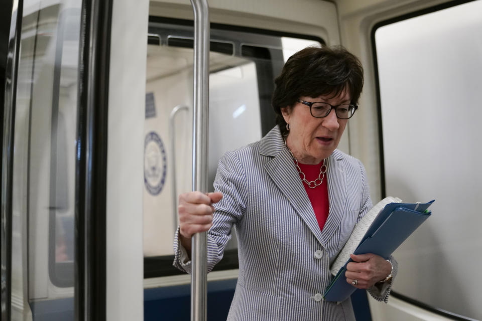 FILE - Sen. Susan Collins, R-Maine, stands in a subway car on Capitol Hill in Washington, June 9, 2022. Collins and Sen. Joe Manchin, D-W.Va., are making the case for overhauling the 1800s-era Electoral Count Act. The two senators pushed Aug. 3, for quick passage of their bipartisan compromise that would make it harder for a losing candidate to overturn the legitimate results of a presidential election. (AP Photo/Patrick Semansky, File)