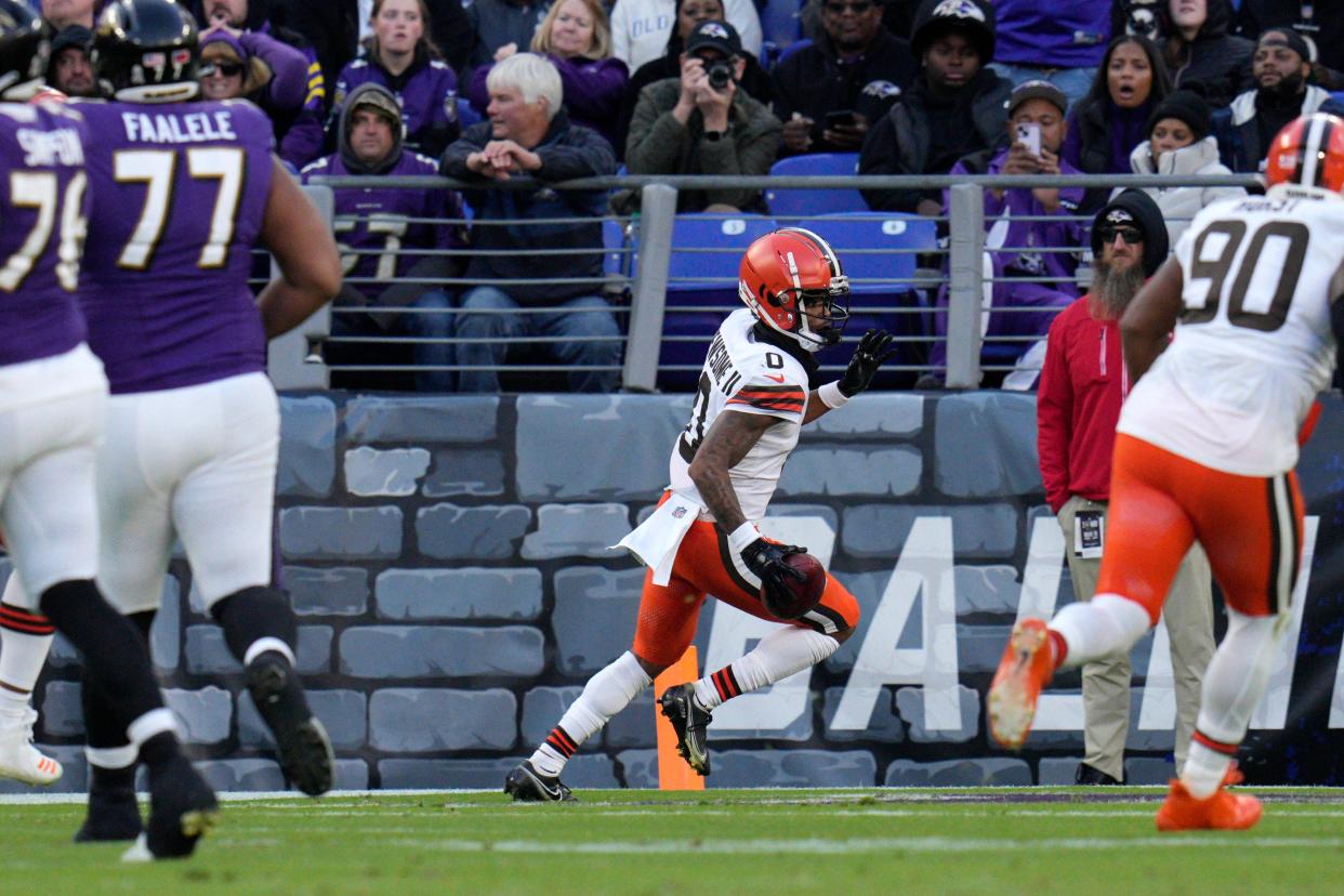 Cleveland Browns cornerback Greg Newsome II (0) celebrates his pick six against the Baltimore Ravens on Nov. 12, 2023, in Baltimore.