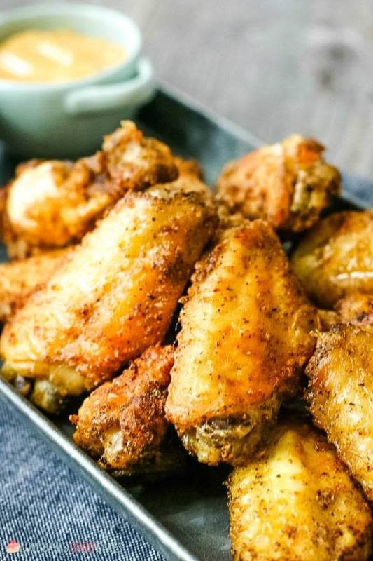 <p>Cooking frozen wings in the air fryer is simple and easy – and I know just how to make air fryer chicken wings that are crispy and delicious! You’ve gotta try my air fryer wings!</p><p><strong>Get the recipe: <a href="https://www.lovebakesgoodcakes.com/air-fryer-chicken-wings/" rel="nofollow noopener" target="_blank" data-ylk="slk:Easy Air Fryer Chicken Wings;elm:context_link;itc:0;sec:content-canvas" class="link rapid-noclick-resp">Easy Air Fryer Chicken Wings</a></strong></p>