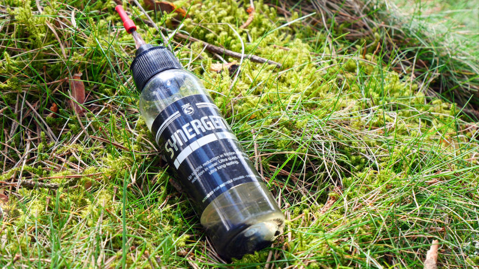 Silca Synergetic wet lube sitting on grass