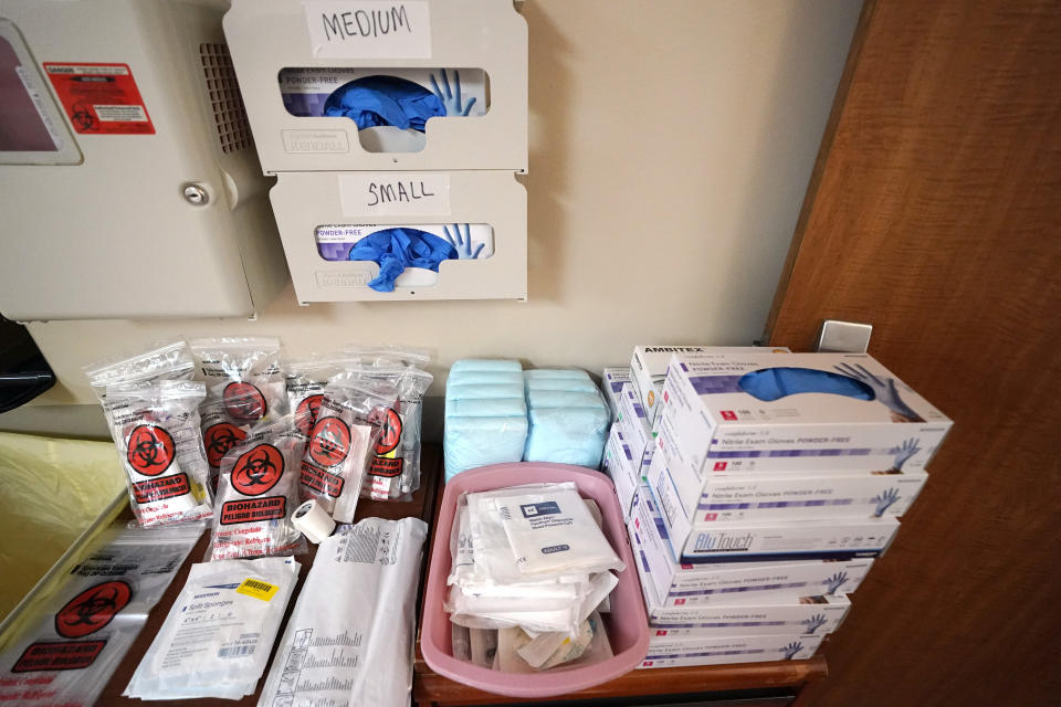 FILE - In this July 16, 2020 file photo, PPE and medical supplies to be used by members of the Urban Augmentation Medical Task Force, are shown inside a wing at United Memorial Medical Center in Houston. Texas reported a new daily record for virus deaths Friday and more than 10,000 confirmed cases for the fourth consecutive day. (AP Photo/David J. Phillip)