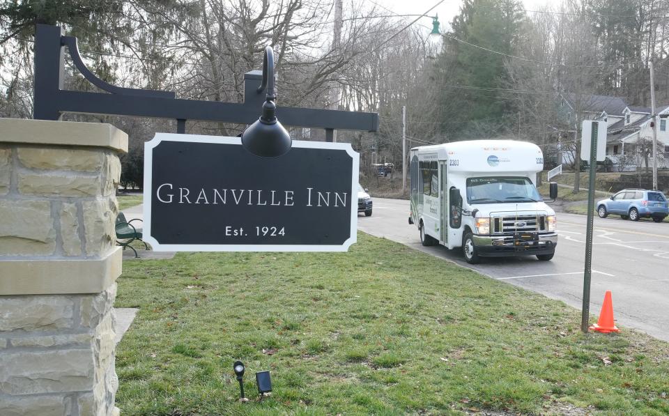 The new Licking County Transit bus travels down Broadway on Monday in Granville, near the Granville Inn.