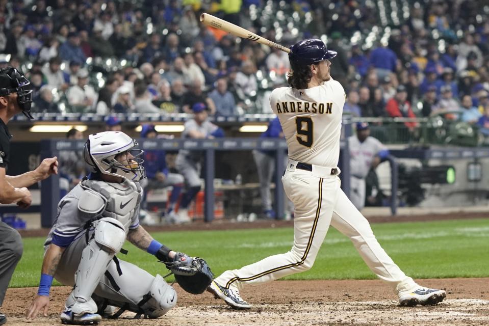 Milwaukee Brewers' Brian Anderson hits a two-run home run during the eighth inning of a baseball game against the New York Mets Tuesday, April 4, 2023, in Milwaukee. (AP Photo/Morry Gash)