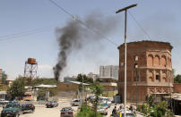 <p>Smoke rises after bomb laden vehicle targeted Iraqi embassy in Kabul, Afghanistan on July 31, 2017. (Haroon Sabawoon/Anadolu Agency/Getty Images) </p>