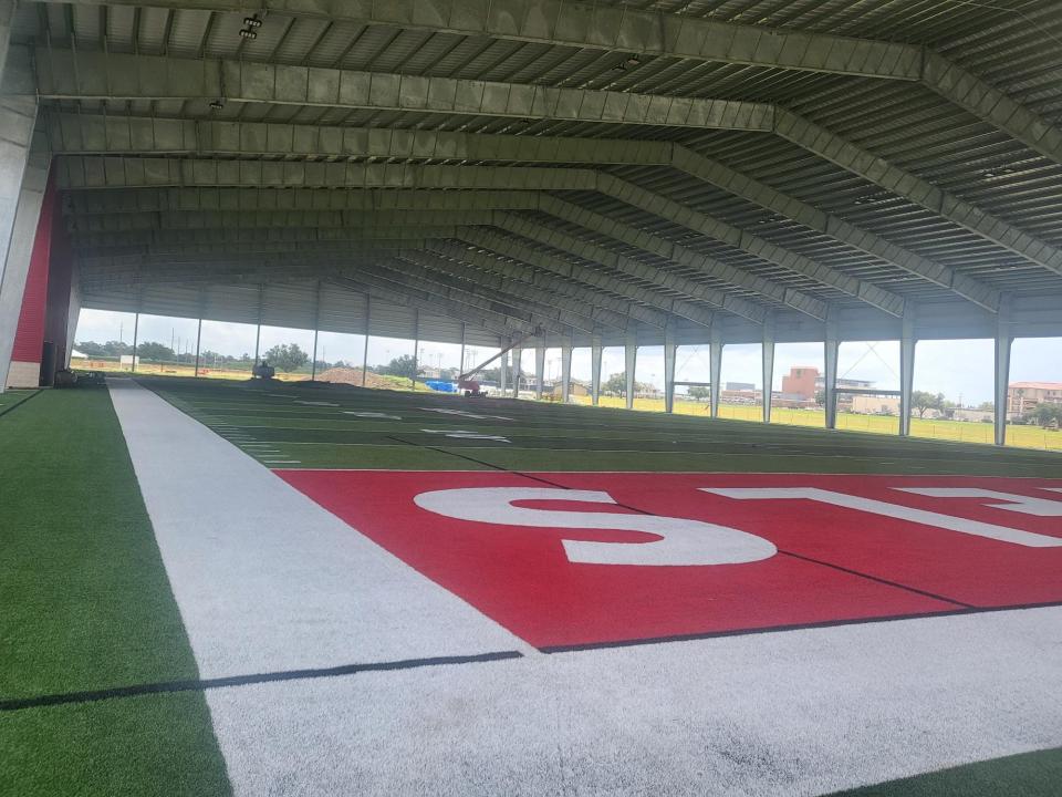 The turf of Nicholls State University's new covered football field. The $5.3 million, 81,000 square foot covered outdoor football training facility will allow students to practice all year round, officials say.