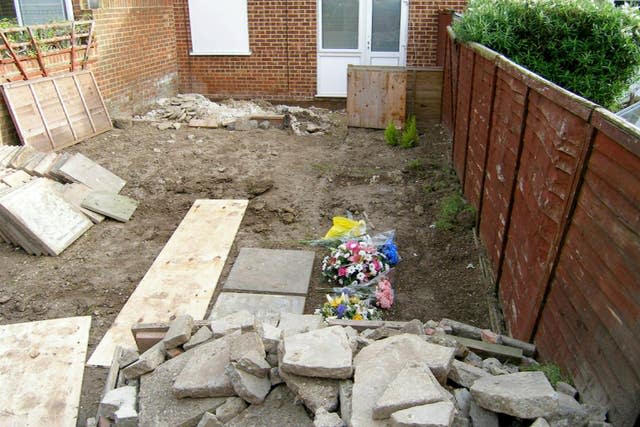 Floral tributes in garden