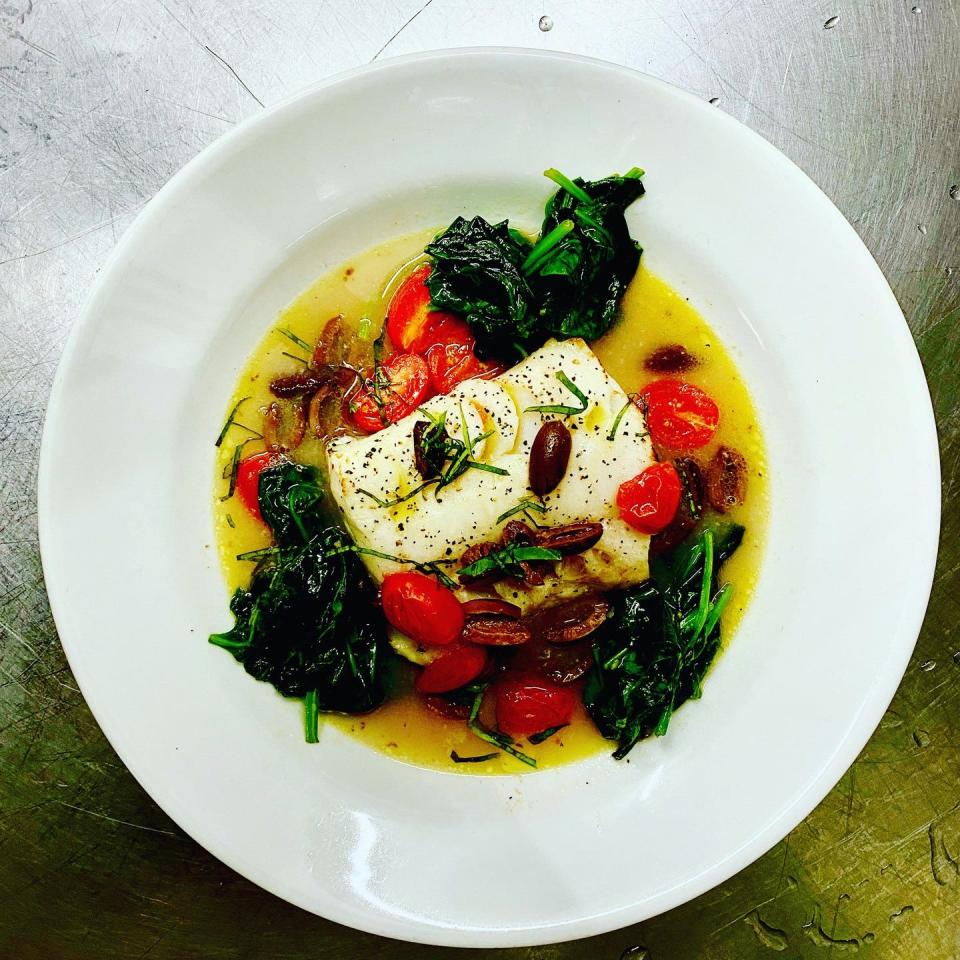 "Diners, Drive-Ins and Dives" host Guy Fieri will feature this Braised Cod with Spinach, Tomato and Olives from Cranston's Edgewood Cafe on a new episode premiering Friday night on Food Network.