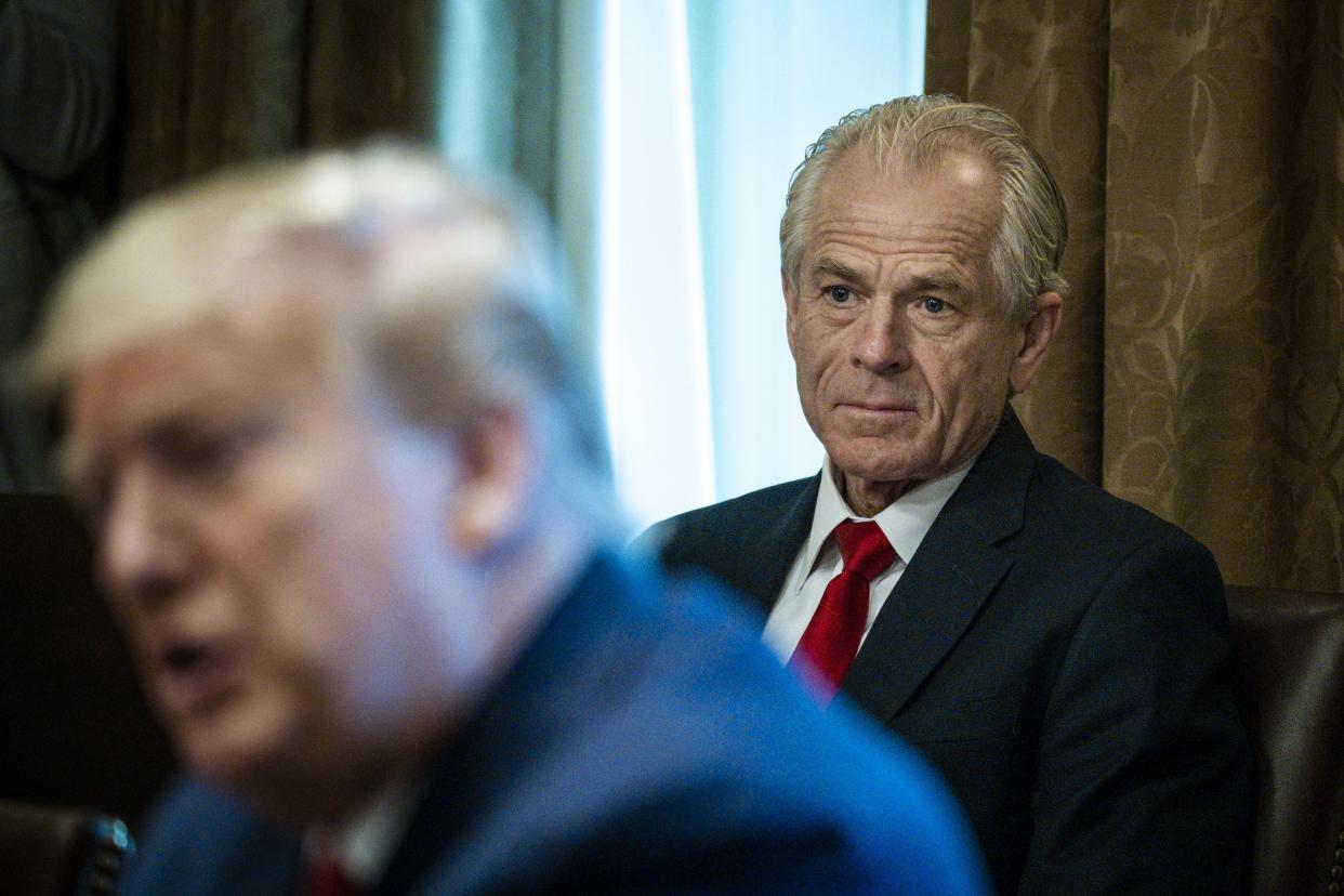 Peter Navarro looks on as then-President Donald Trump meets with supply chain distributors in reference to the COVID-19 coronavirus pandemic in the Cabinet Room in the West Wing at the White House in Washington, D.C. on Sunday, March 29, 2020.
