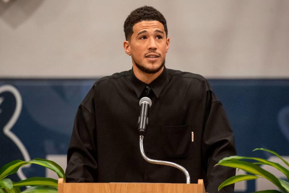 NBA star Devin Booker speaks during a ceremony for the retirement of Booker’s high school jersey at Moss Point High School in Moss Point on Saturday, Dec. 10, 2022.