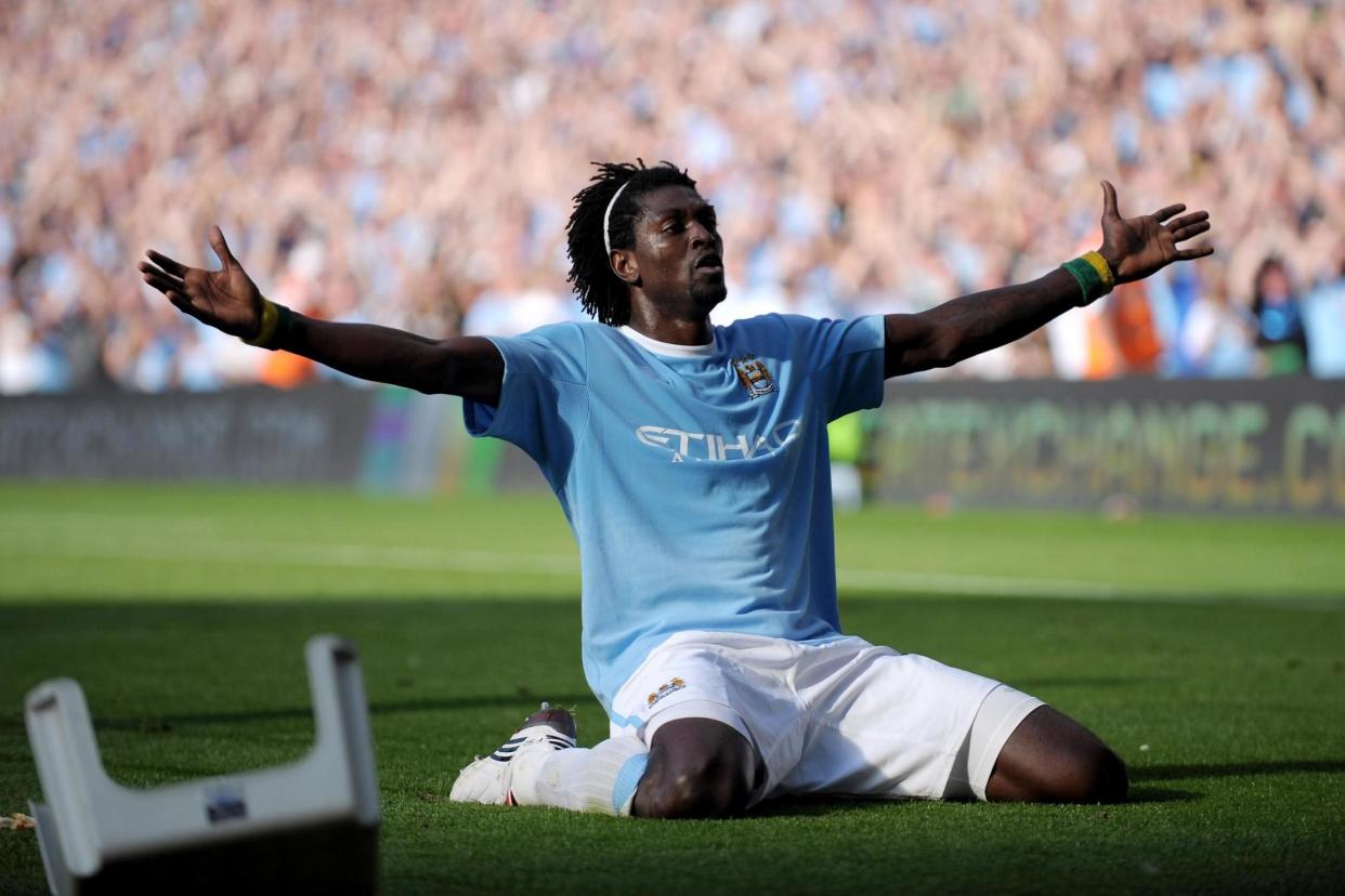 Adebayor ran the length of the pitch to taunt Arsenal fans in 2009: Getty Images